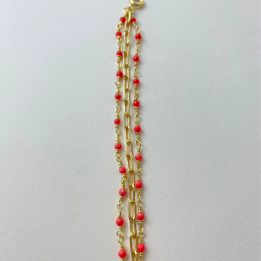 Bracelet Une à Une doré et corail